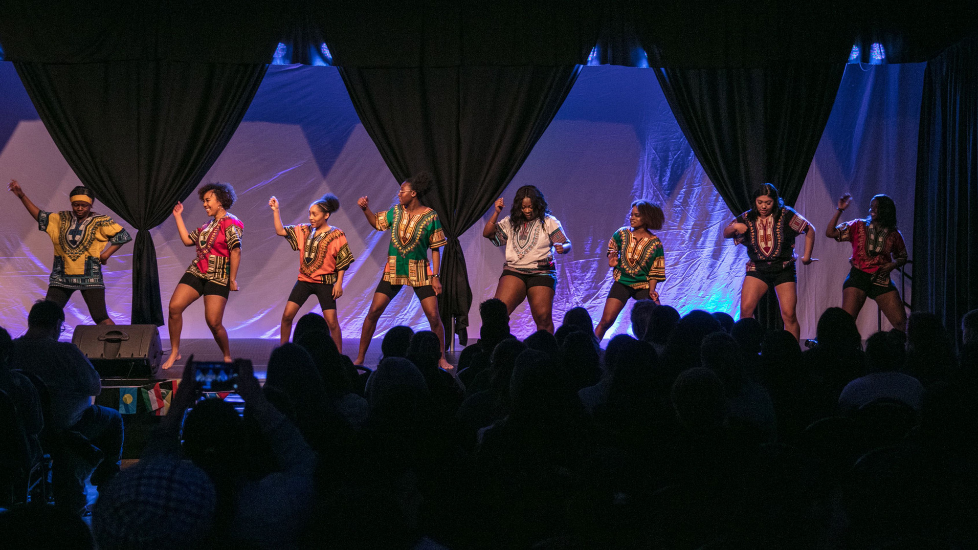 Eight students of African descent doing a traditional dance at Central Washington University