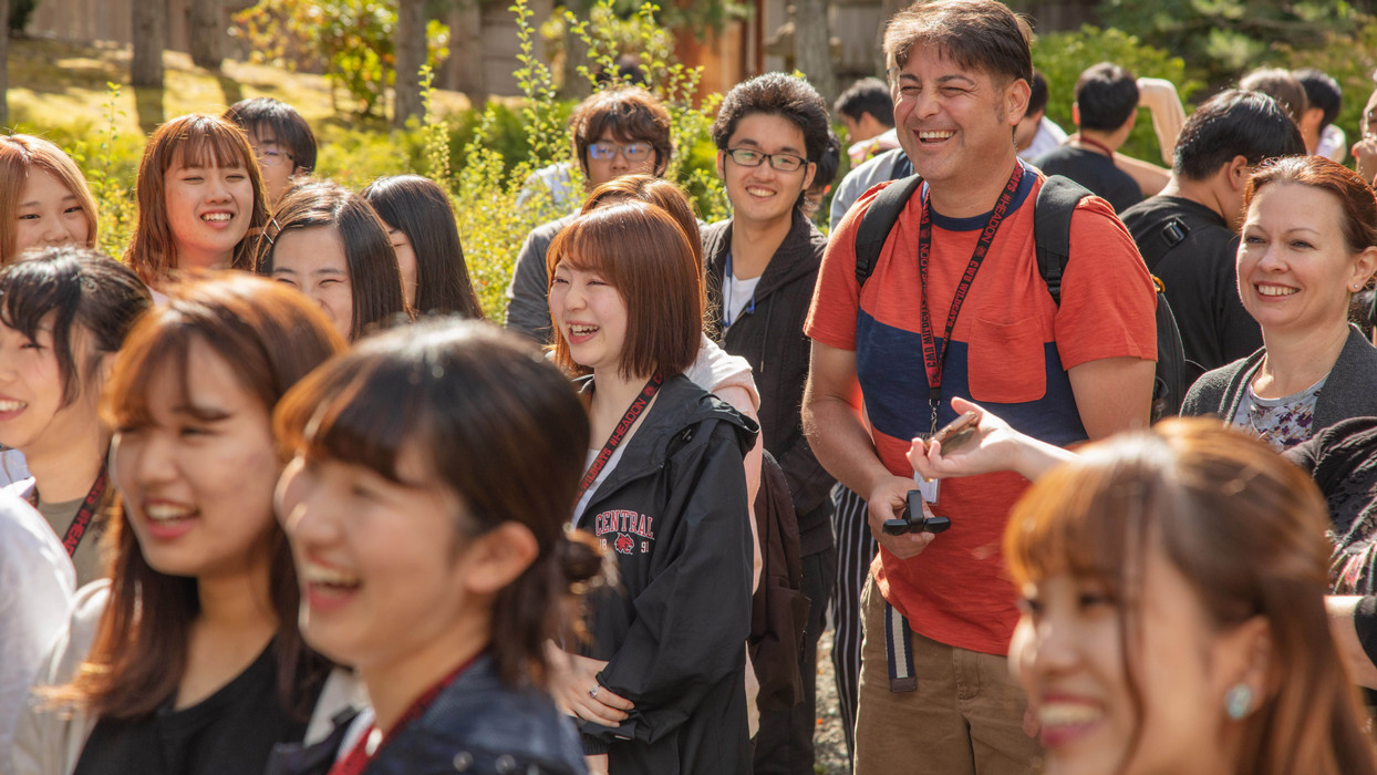 Dozens of students take a walk and share a laugh at Central Washington University.