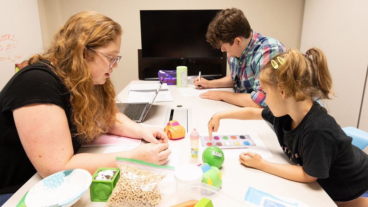 A woman works with a child within the child development program at Central Washington University. 