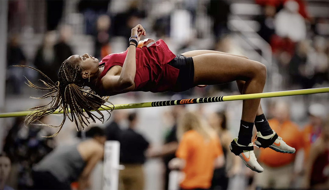 CWU track athlete Emy Ntekpere clears the high jump bar