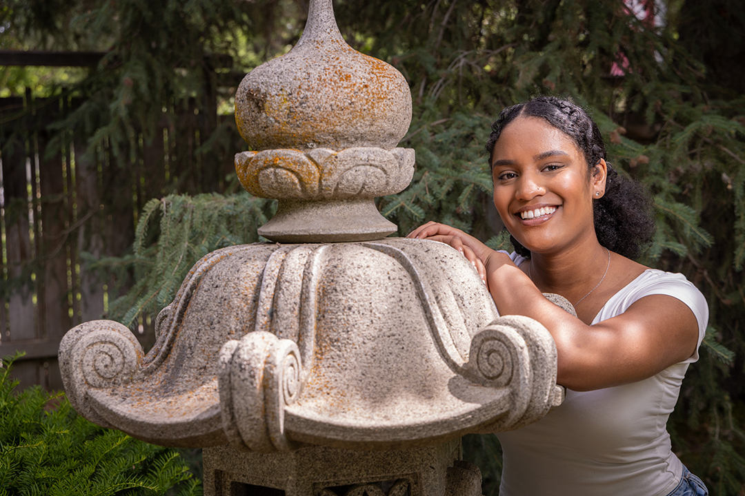CWU student Diana Schneider poses in the Japanese Garden