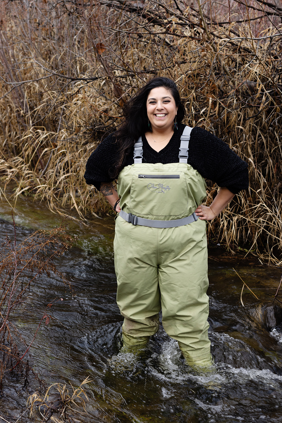 J Shah stands along the Yakima River