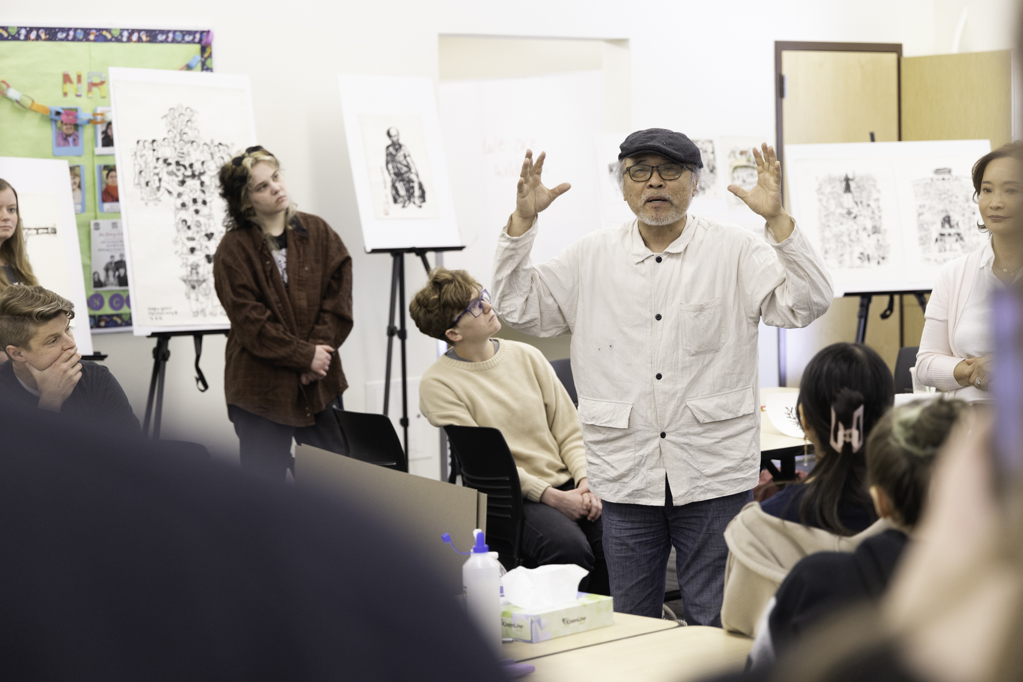 Artist giving a talk during class