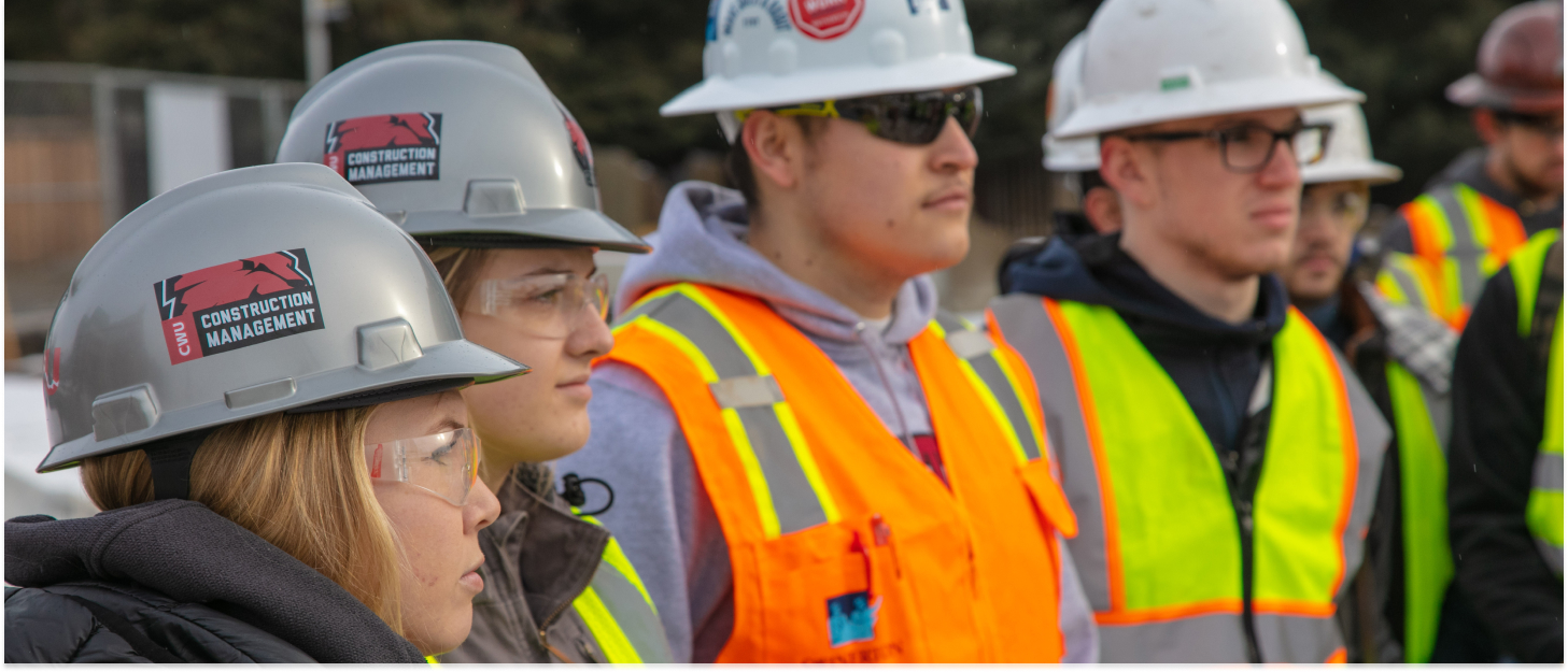 Construction Management students wearing their helmets and other safety gear