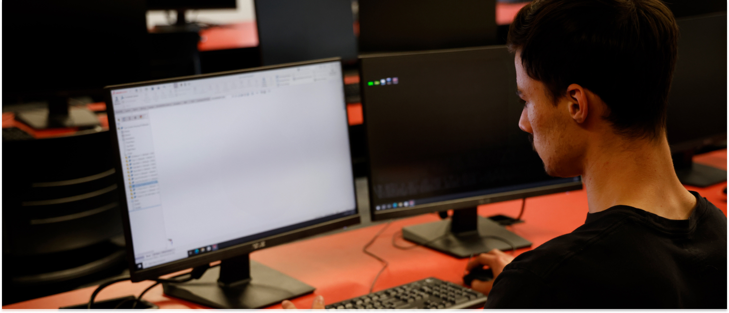 Student working in front of a computer.