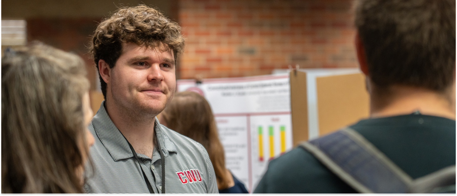 Student getting ready to present their research.