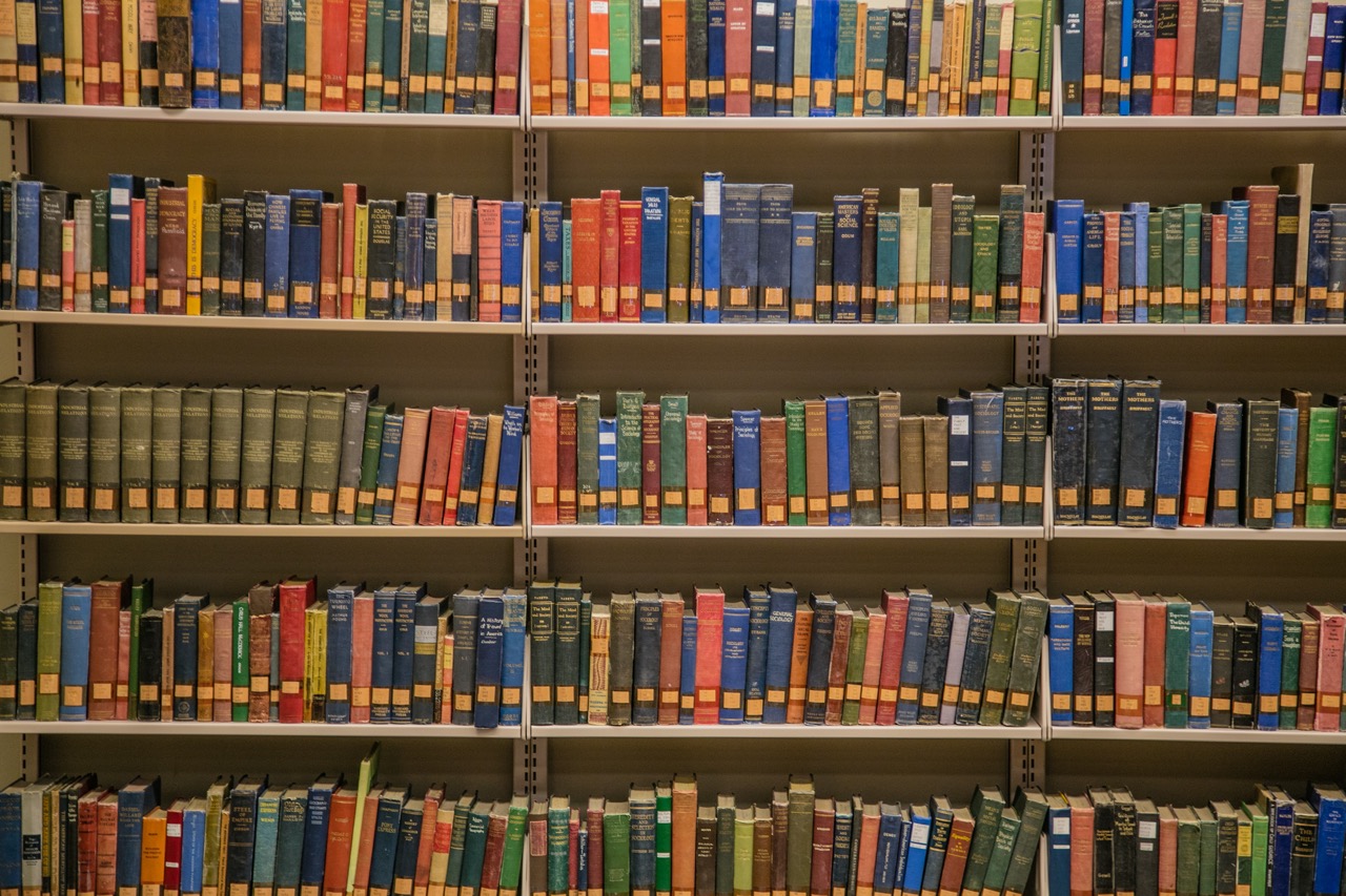 Shelves filled with books at the CWU Brooks Library