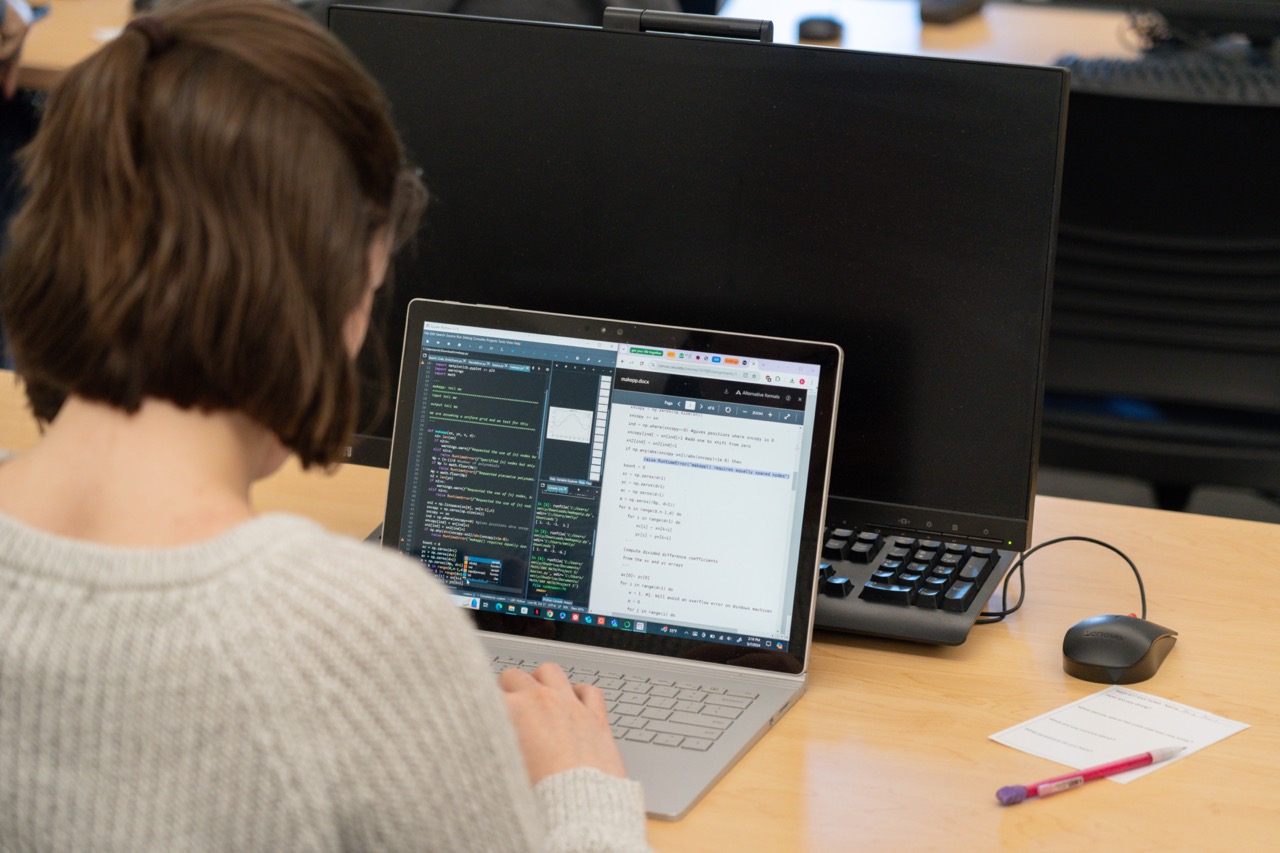 Student working on a laptop.