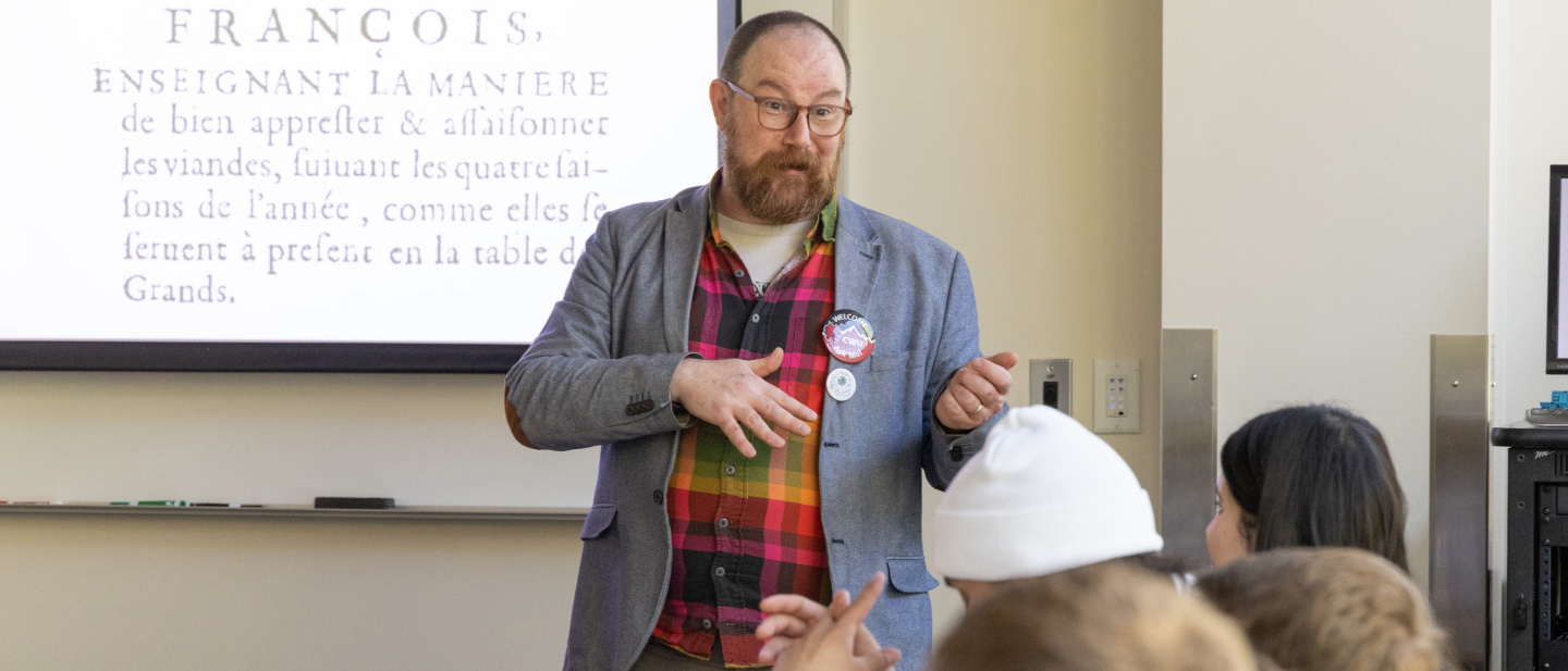 professor with cwu pin giving students a lecture