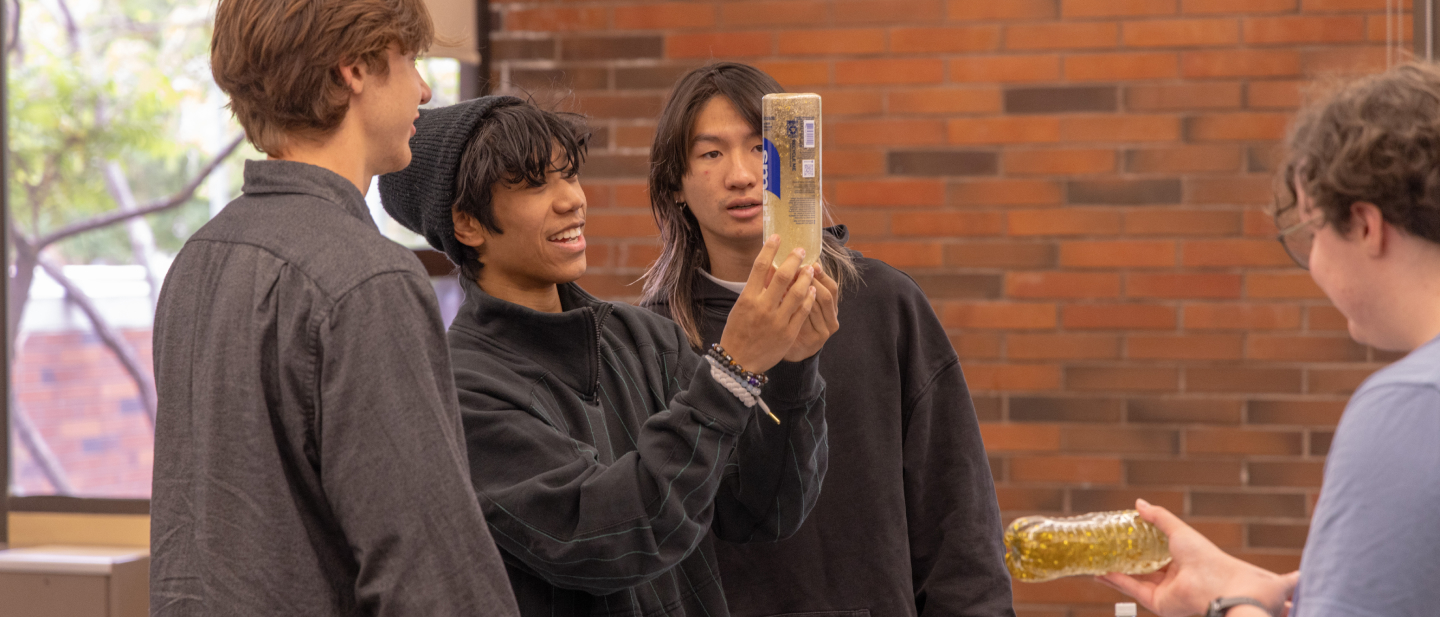 students performing mixing experiments