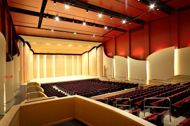 A very vibrant, colorful photo of the CWU Concert hall from the upper most corner in the rear of the hall.