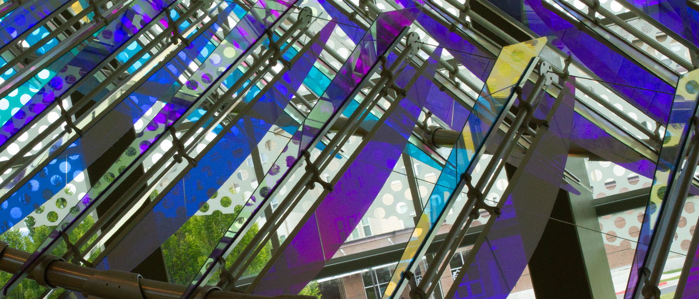 Octaves of Light artwork hanging in the music building rotunda.