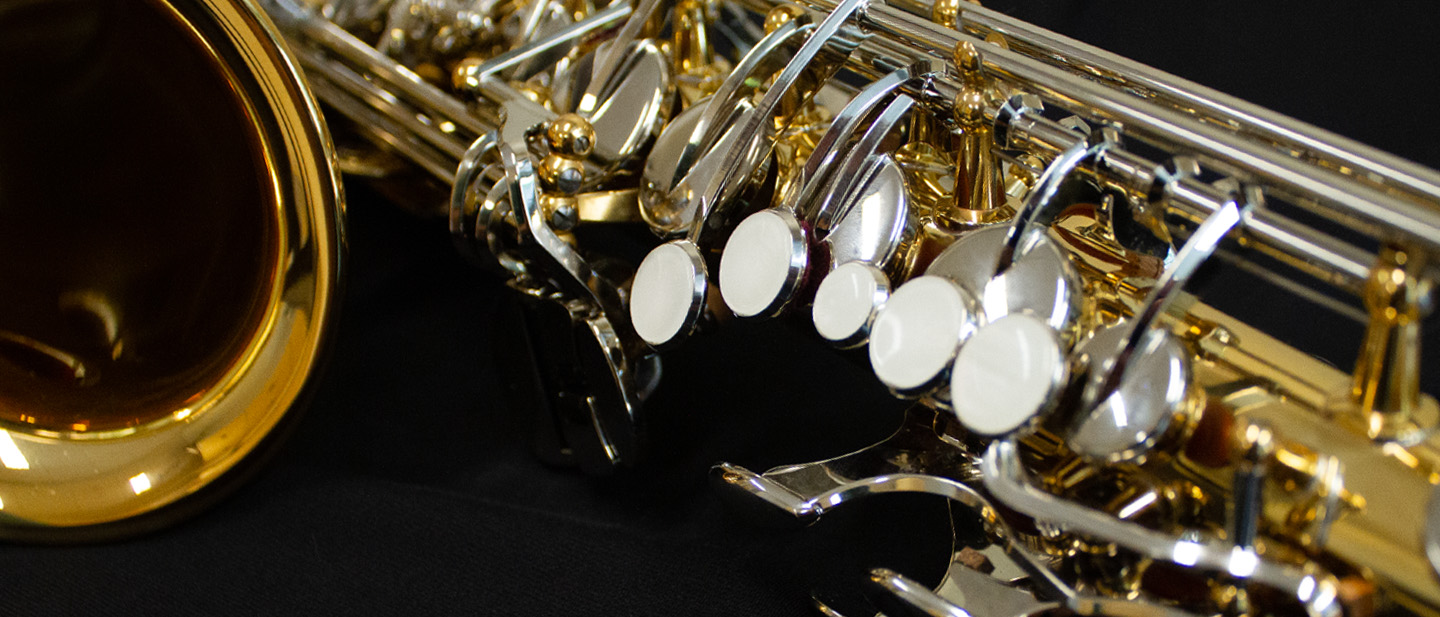 Closeup image of an alto saxophone.