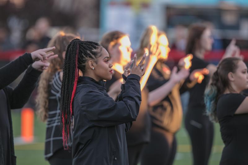 ASL students sign national anthem in ASL at a CWU hosted game