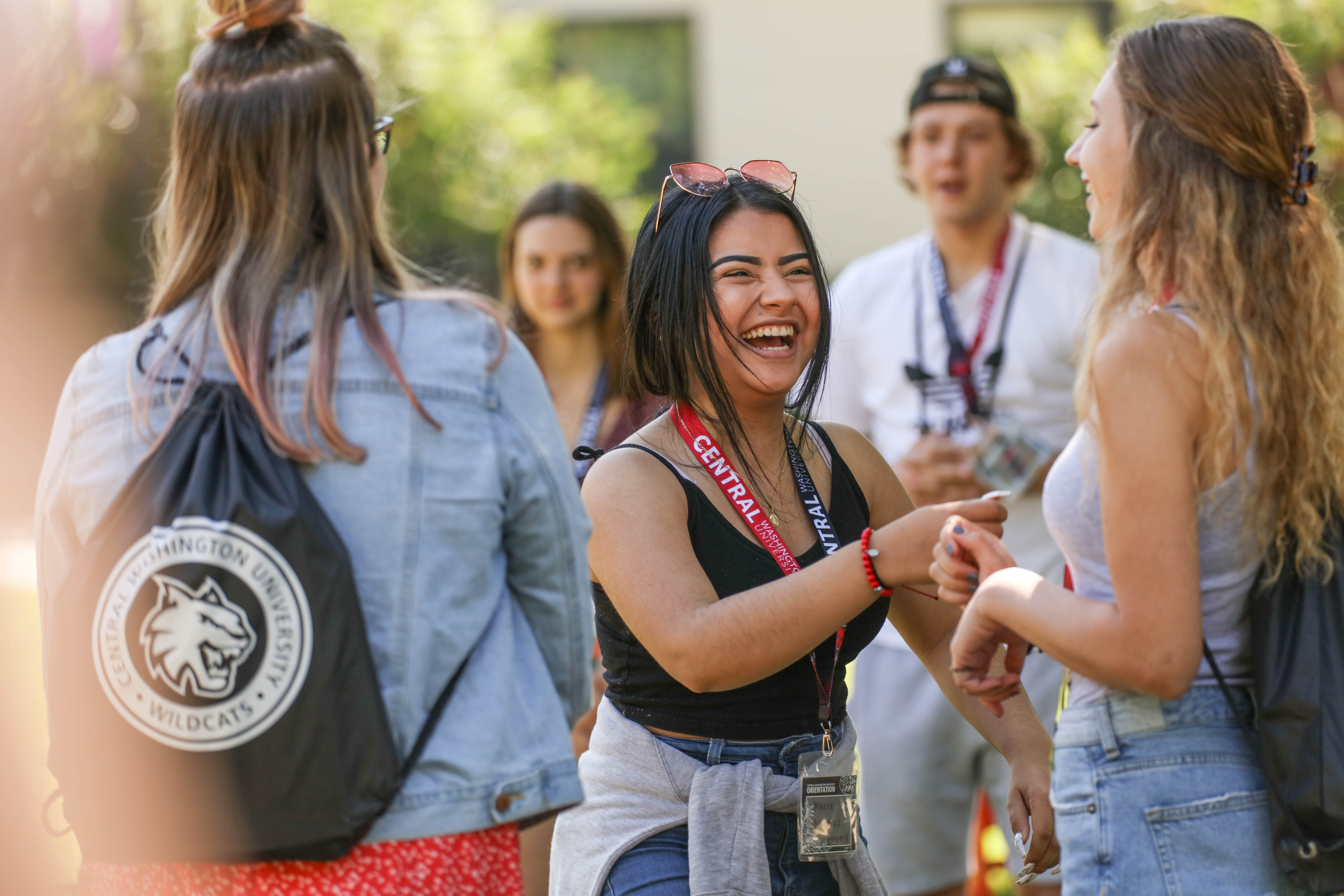 Student laughing during a student preview day.