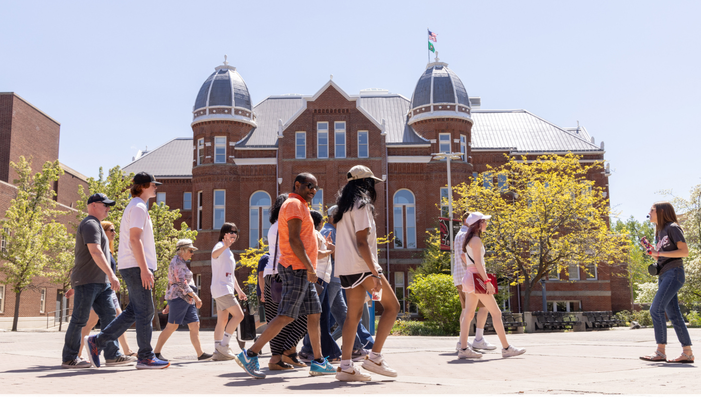 Students and parents touring campus.